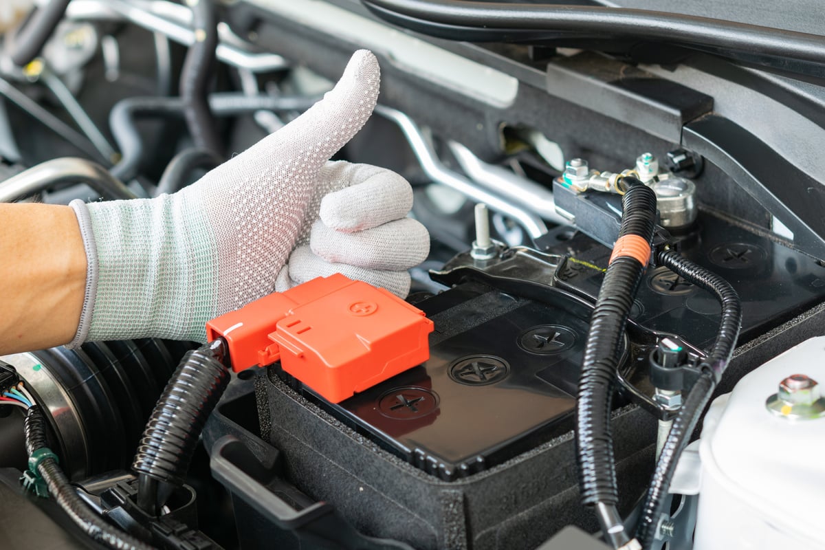 Technician check battery car terminal